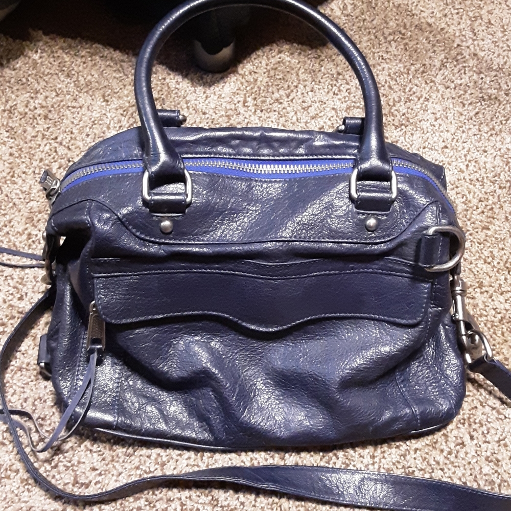 A navy blue Rebecca Minkoff leather purse